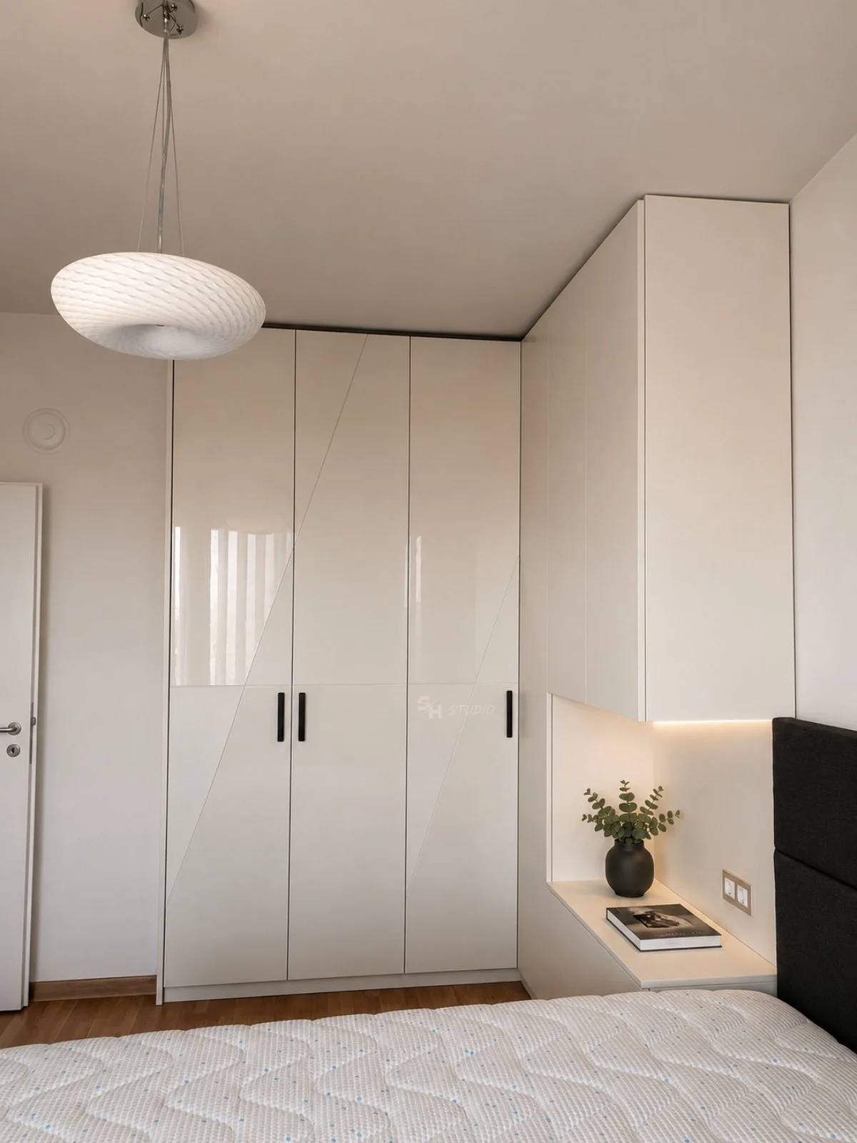 SHIR Residence — full-height white wardrobe and integrated bedside niche