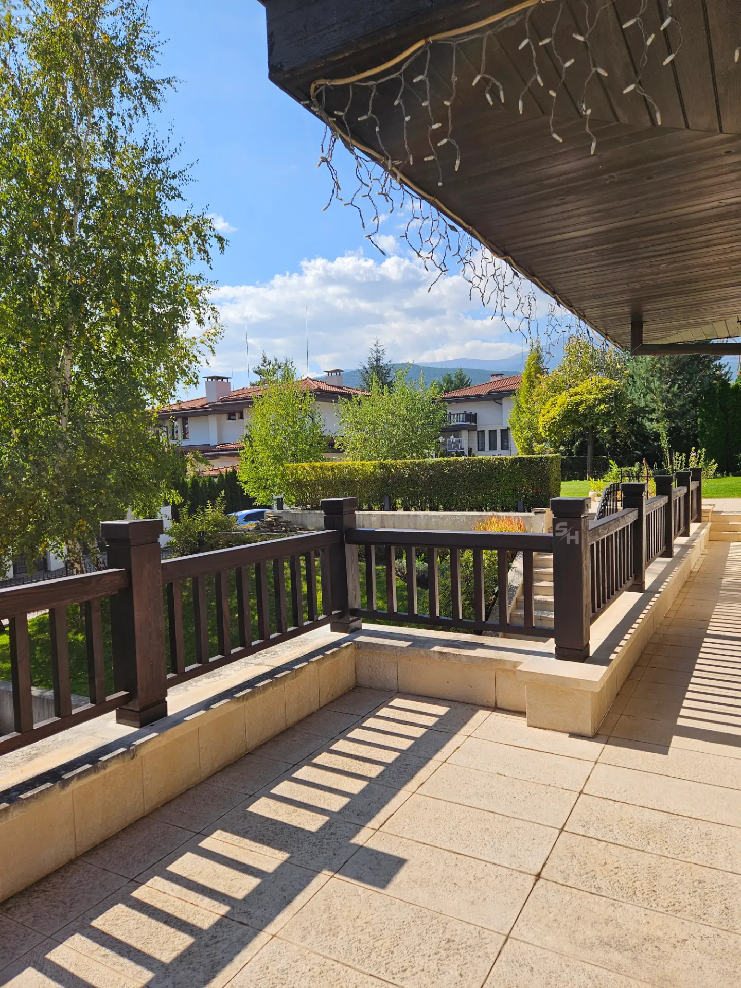 KPI Residence — solid-wood terrace railing