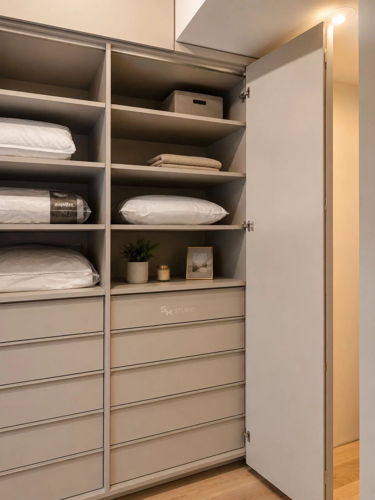PSHM Residence — wardrobe interior with drawers and linen shelving