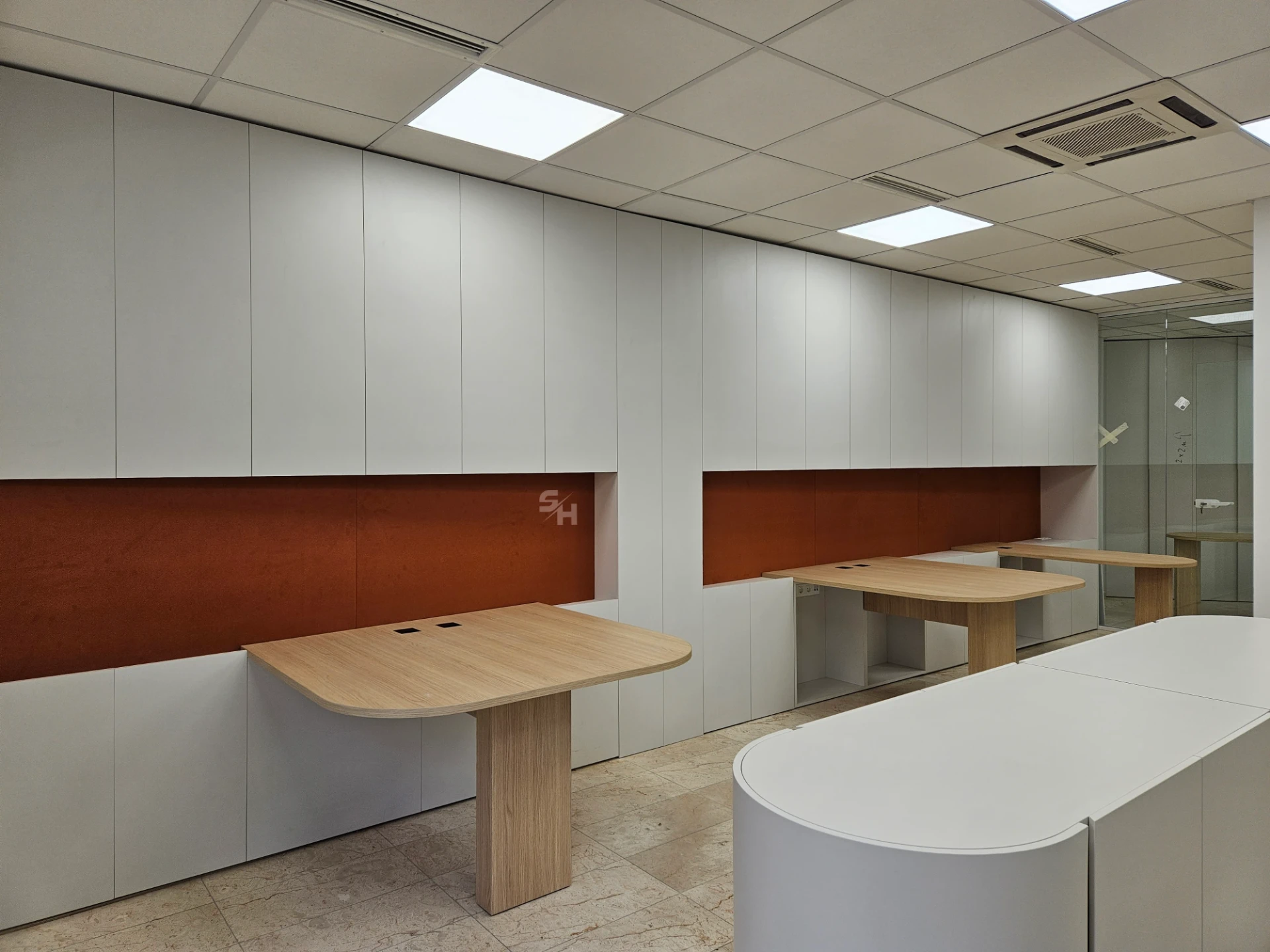 VDR Office — creative workspace with curved desks, filing wall and mobile curved cabinet