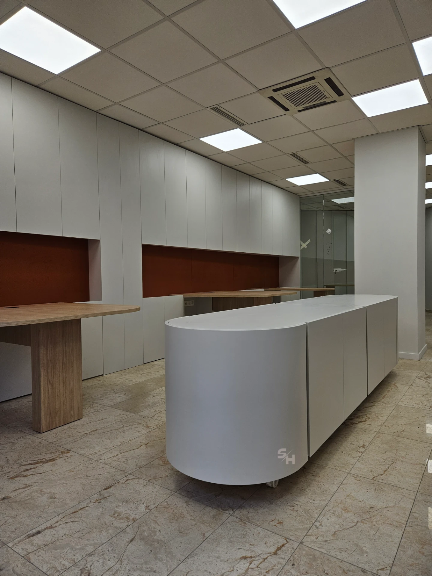 VDR Office — creative workspace with curved desks, filing wall and mobile curved cabinet