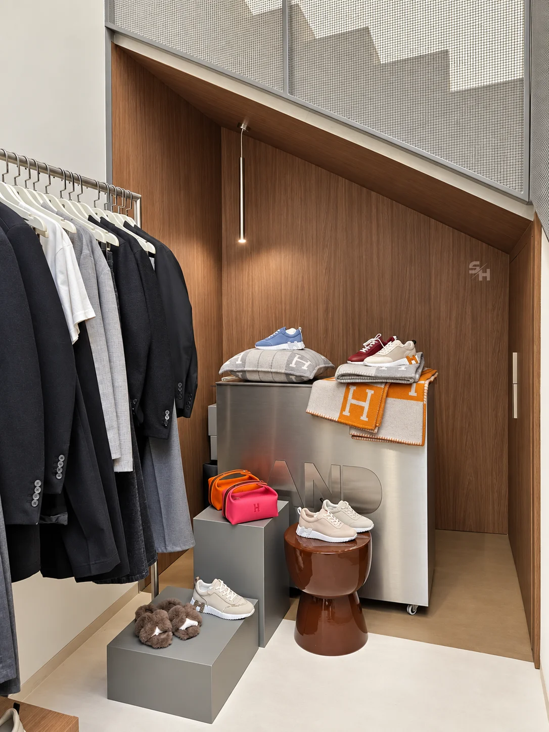 AND menswear store — counter, display alcoves and stair hall