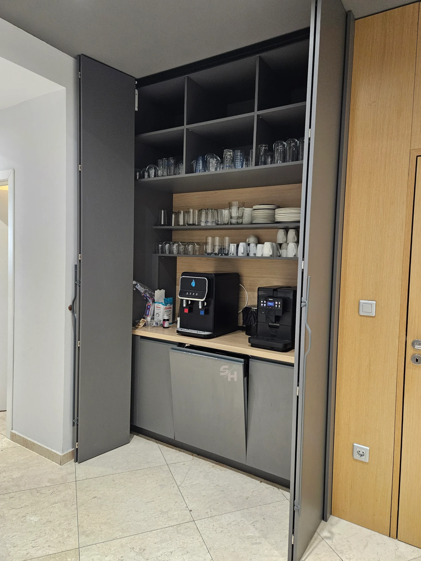VDR Office — former wardrobe converted into a mini kitchen with bi-fold doors