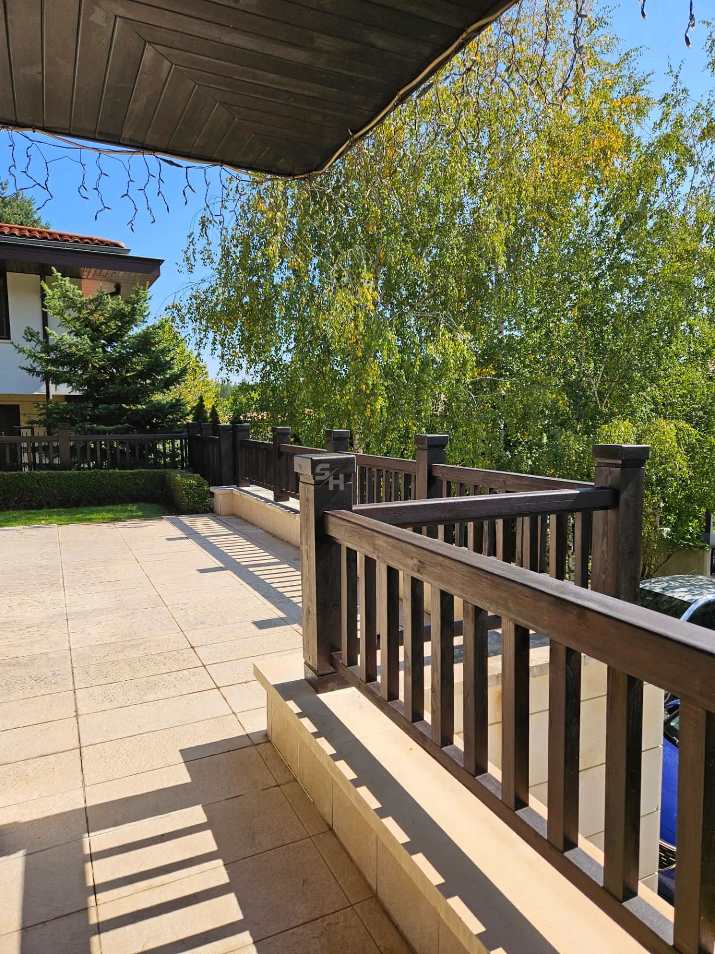 KPI Residence — solid-wood terrace railing