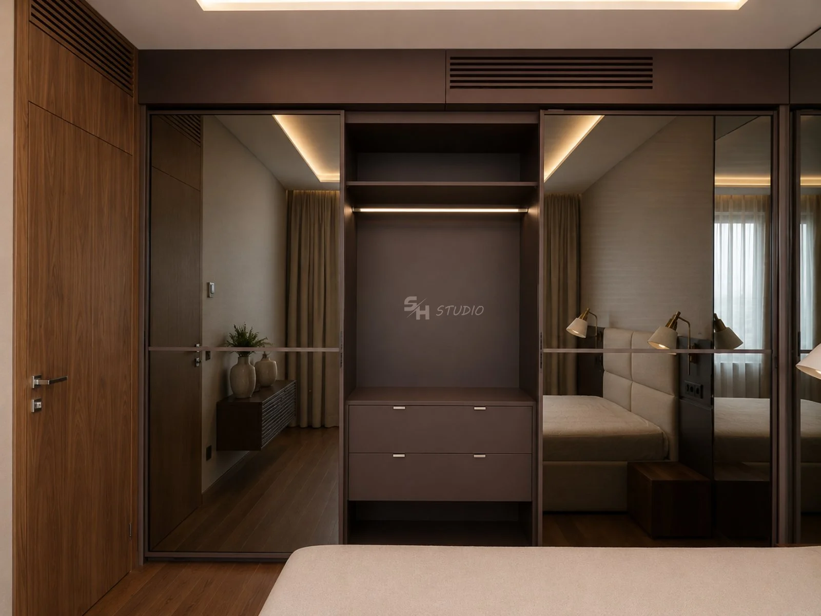 ADVH — guest-room wardrobe with Stopsol glass sliding doors and metal profiles