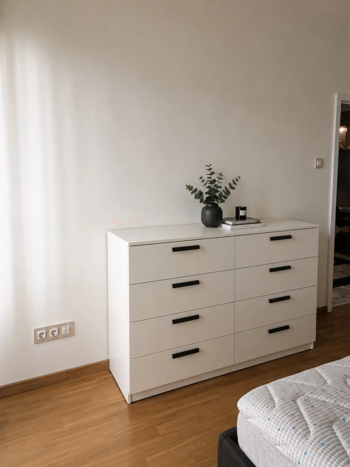 SHIR Residence — custom white chest of drawers with black handles