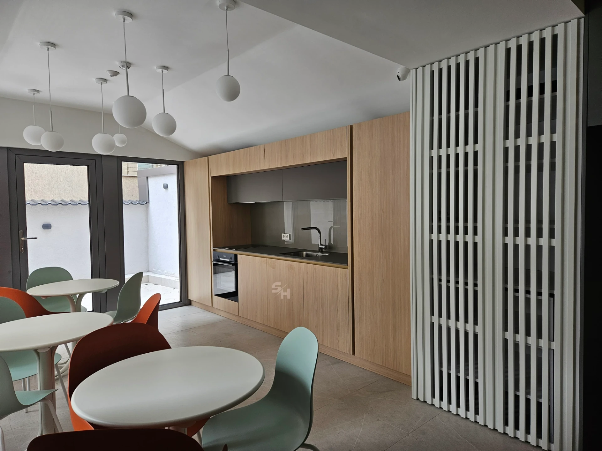VDR Office — former wardrobe converted into a mini kitchen with bi-fold doors