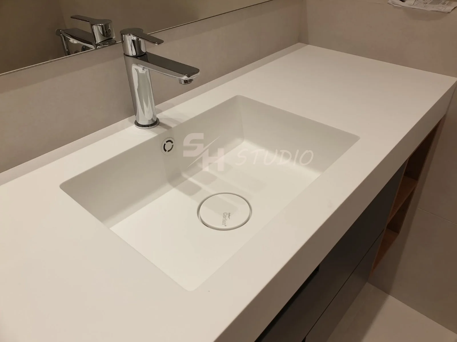 MMK Residence — integrated Corian basin and custom vanity