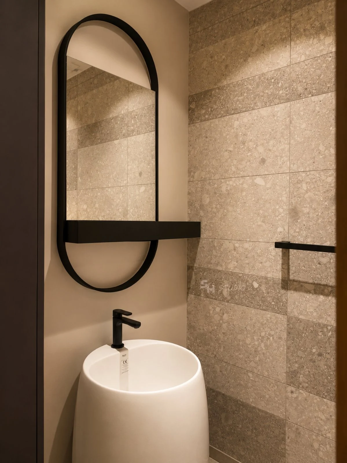 ADVH — freestanding Corian basin and mirror in a black metal frame with shelf