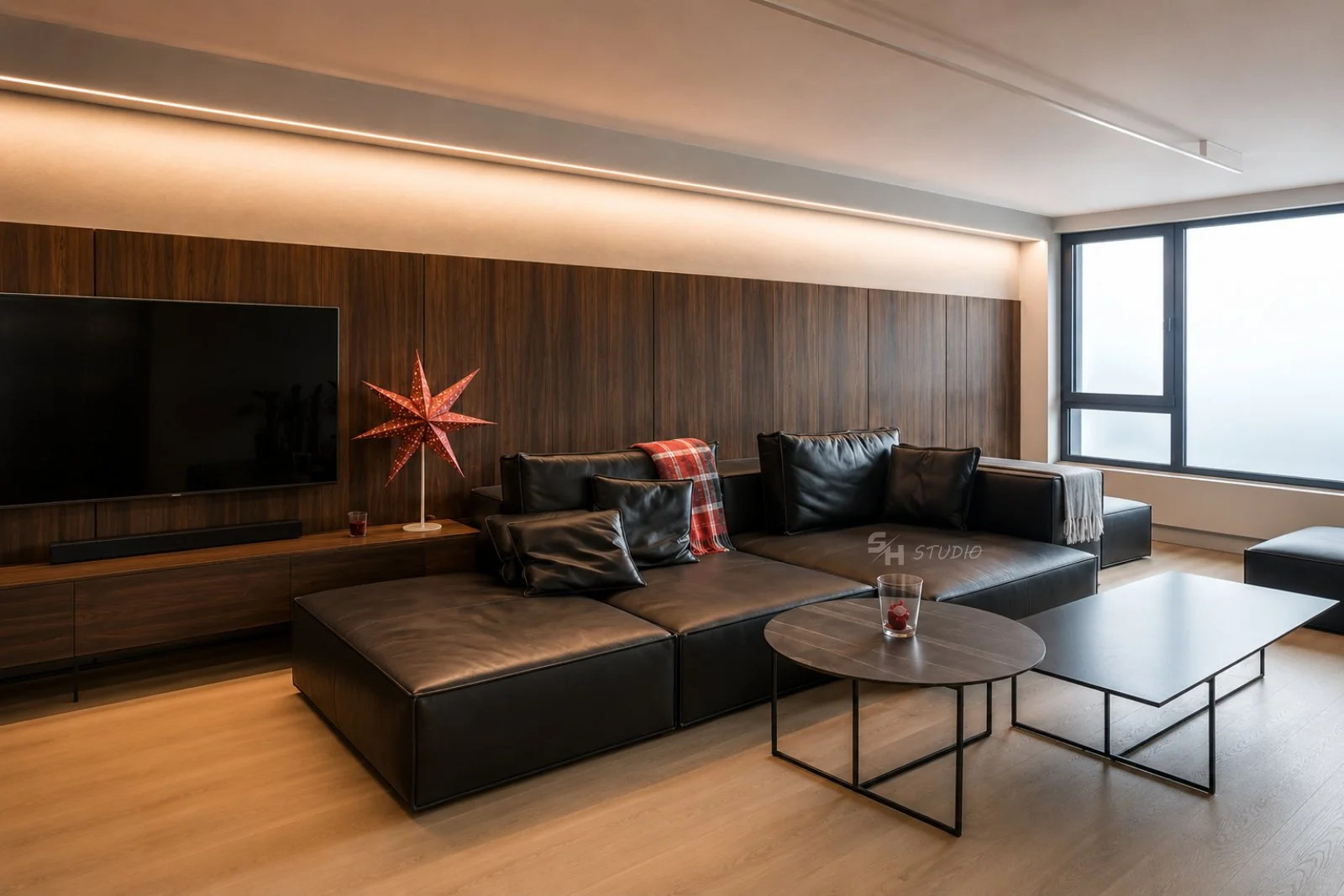 PSNG — living room with modular natural-leather sofa and walnut wall panelling