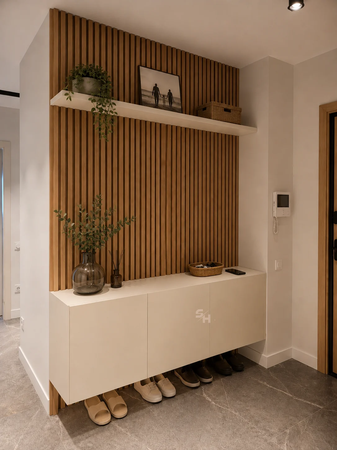 KDIA Kitchen & Living Room — entrance hall with oak-veneered slatted panelling and wall-mounted cabinet