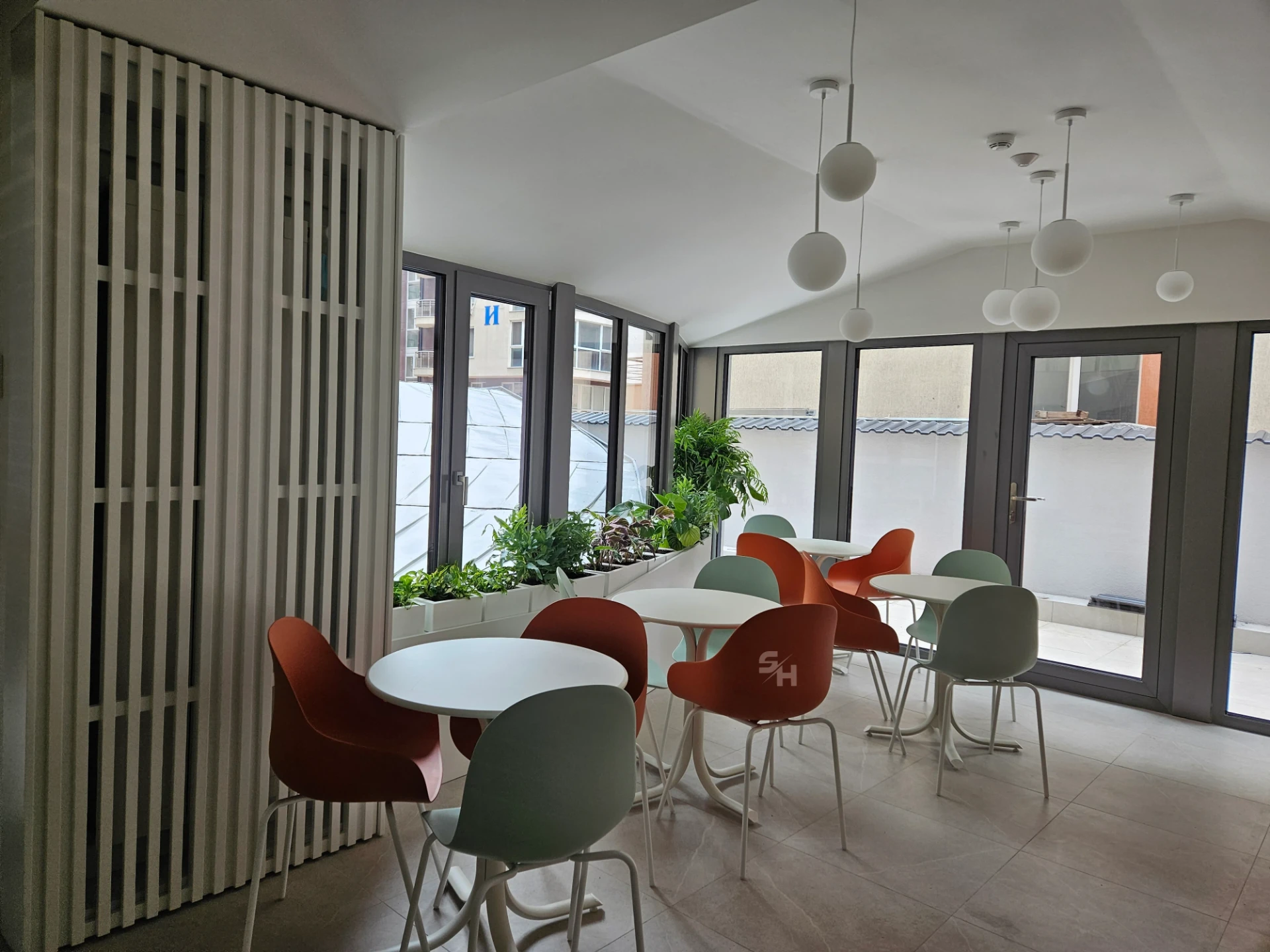 VDR Office — former wardrobe converted into a mini kitchen with bi-fold doors
