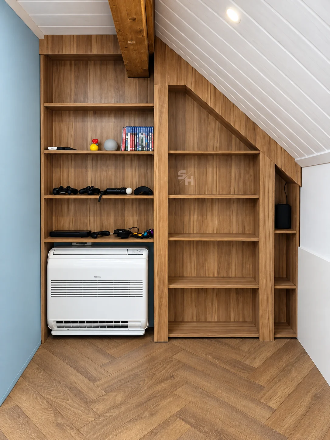 Attic Spaces — built-in shelves following the roofline