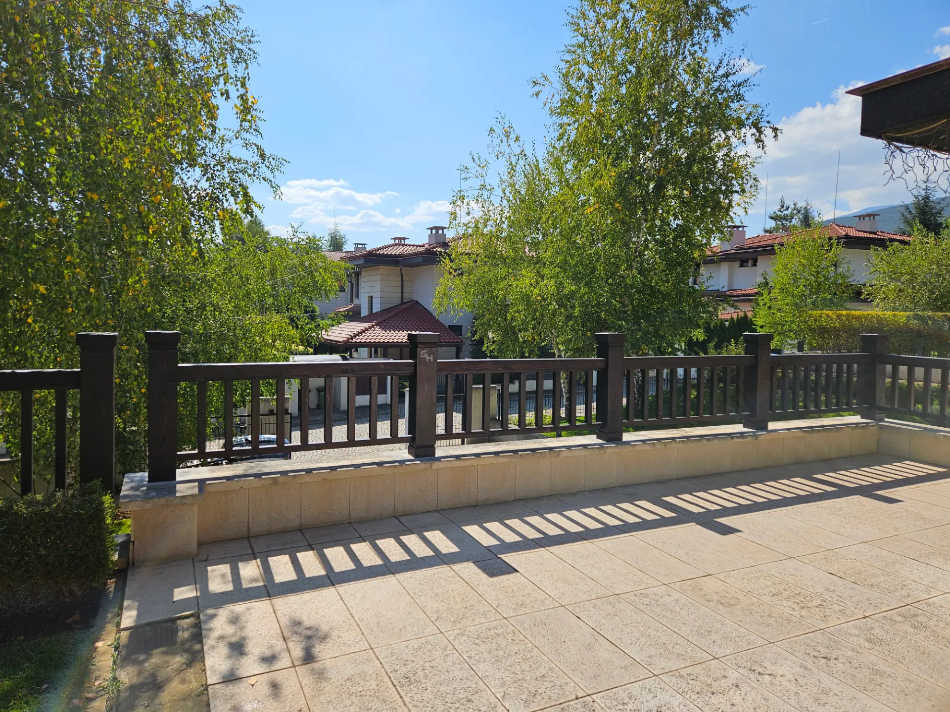 KPI Residence — solid-wood terrace railing