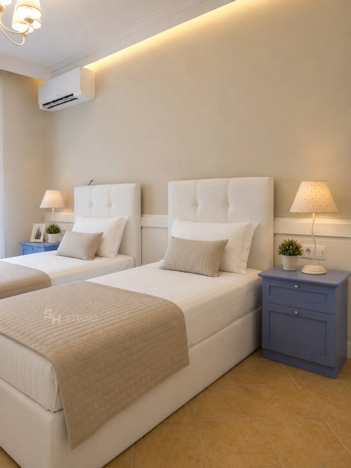 DIYT Apartment — two upholstered single beds with painted bedside cabinets