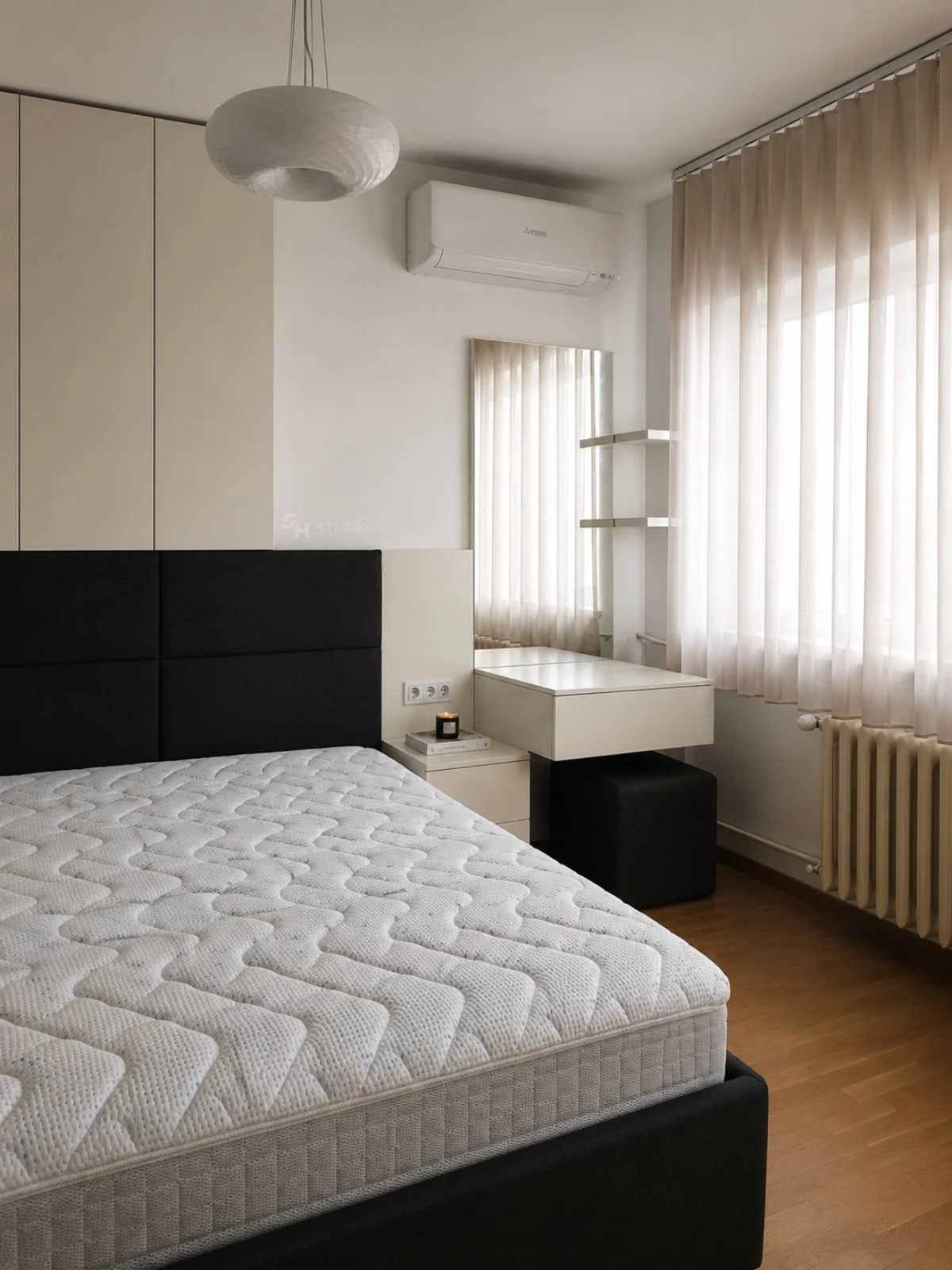 SHIR Residence — bedroom with a fitted dressing table, mirror and storage