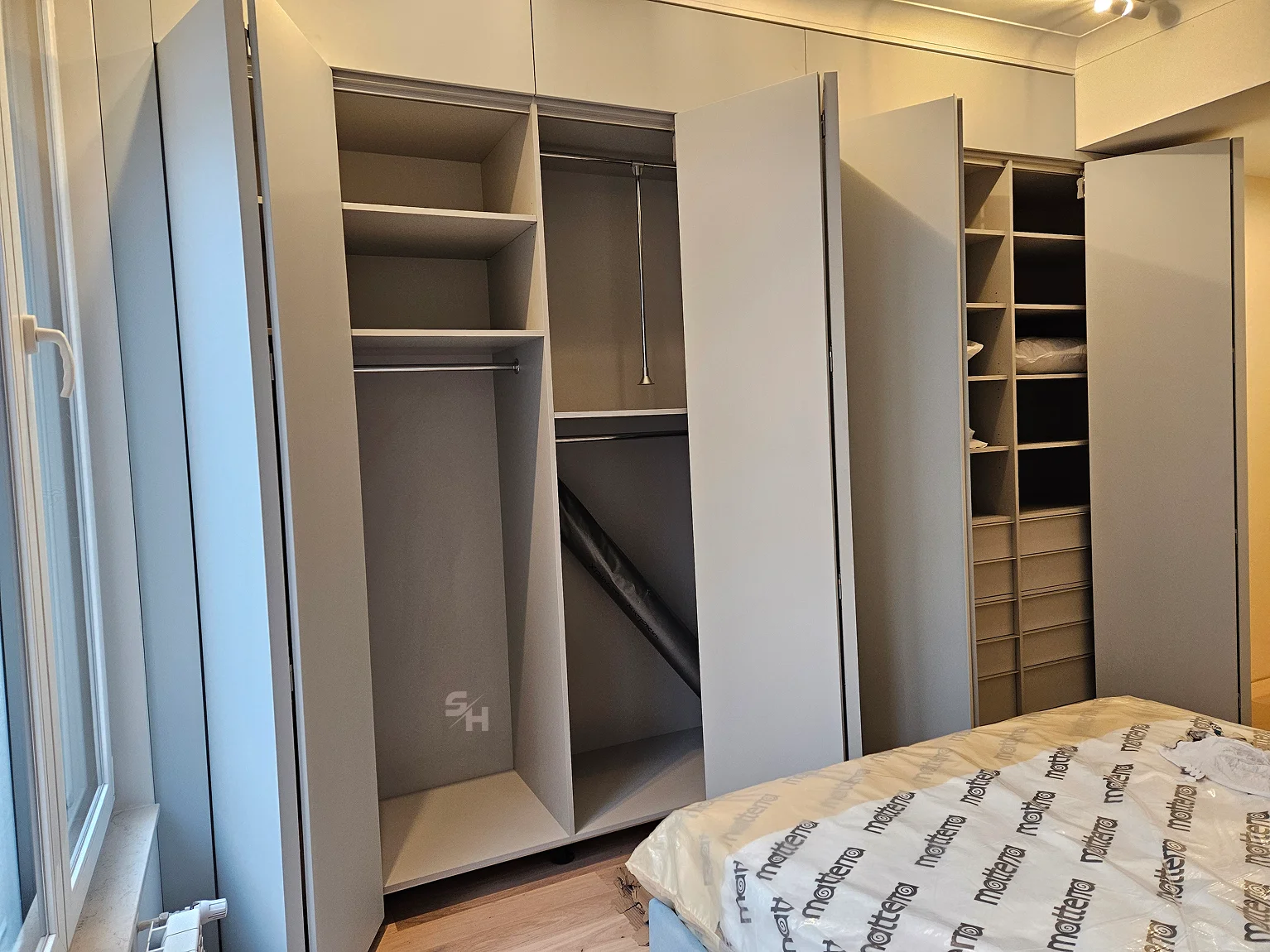 PSHM — open wardrobe interior with rails and shelving