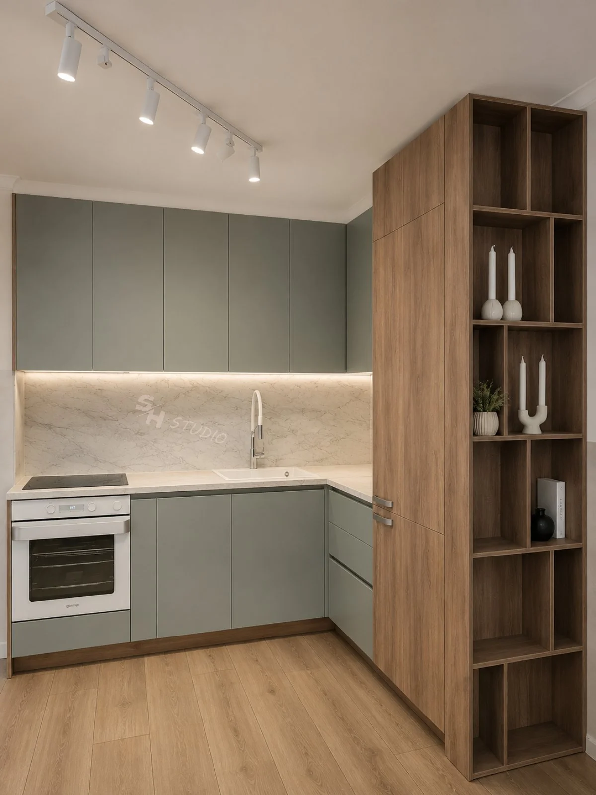GB Residence — pale blue corner kitchen with oak-effect tall storage and shelving