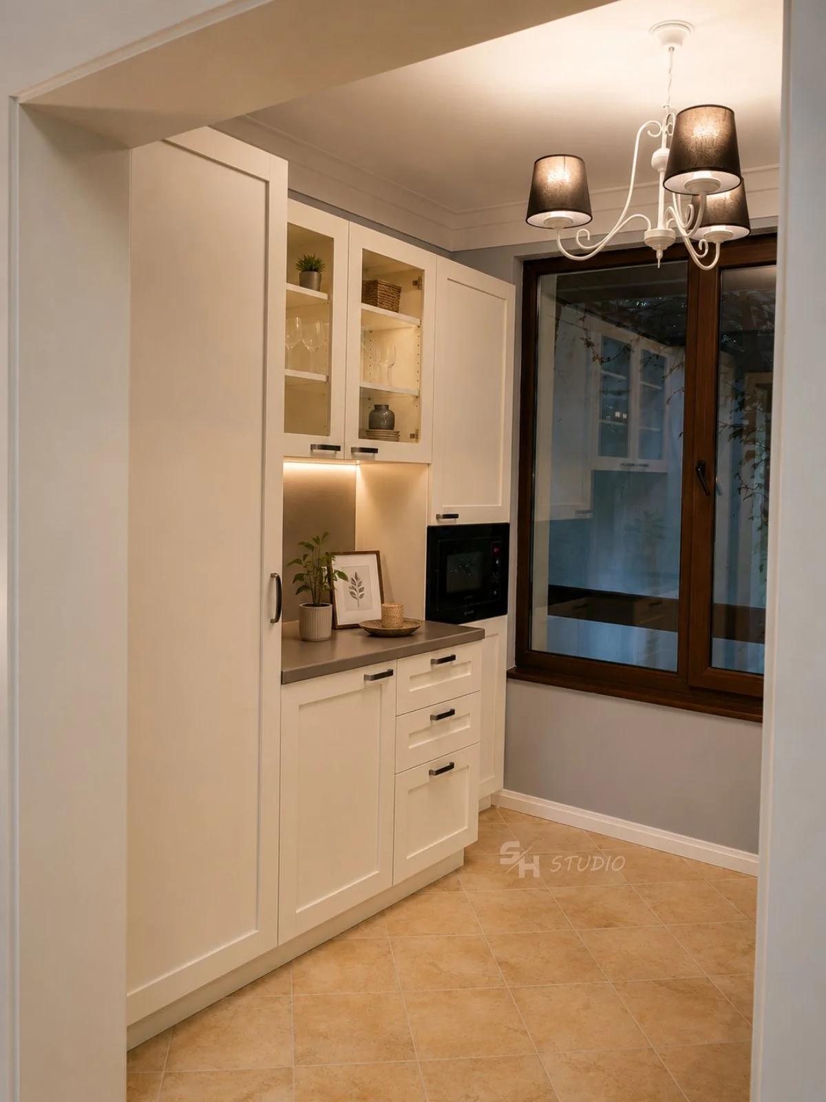 DIYT Apartment — kitchenette with framed cabinets, glass-fronted storage and drawers