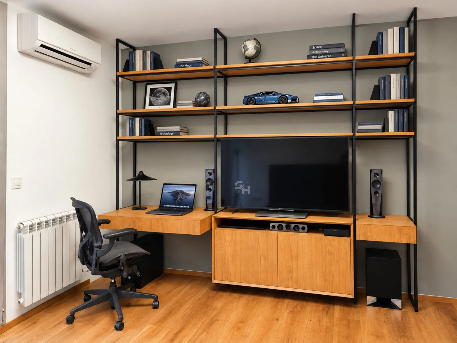 DTDSG — black steel and oak media wall with integrated desk