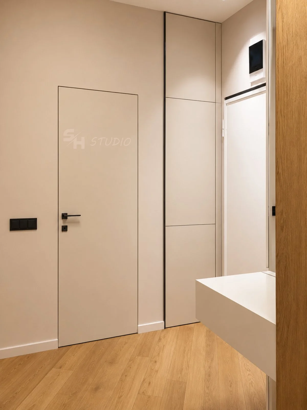 MMK Residence — entrance hall with flush doors and integrated wardrobe