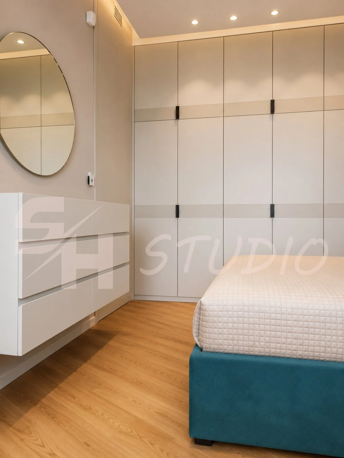 MMK Residence — wall-mounted chest of drawers and full-height wardrobe
