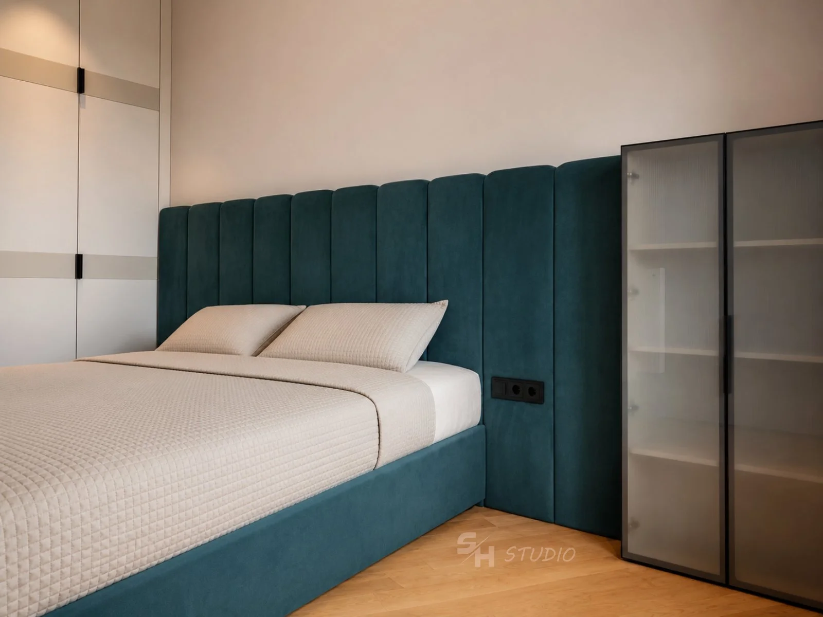 MMK Residence — upholstered bed, full-height headboard and display cabinet