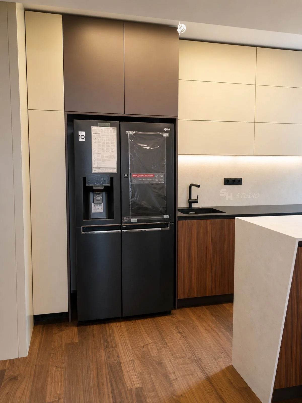 ADVH — full-height appliance column in super-matt painted MDF and walnut veneer