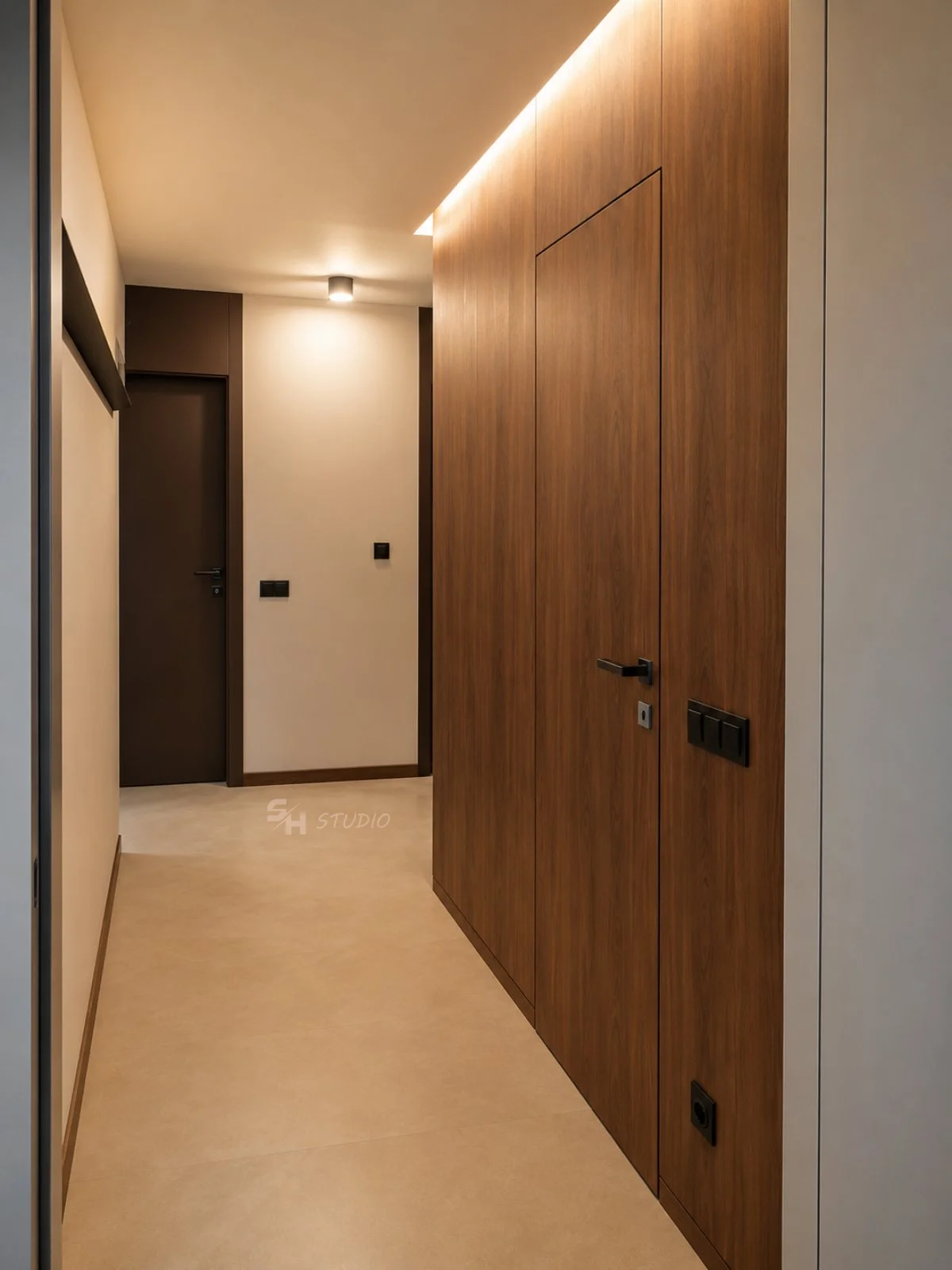 ADVH — entrance hall with walnut-veneered wardrobe and interior door