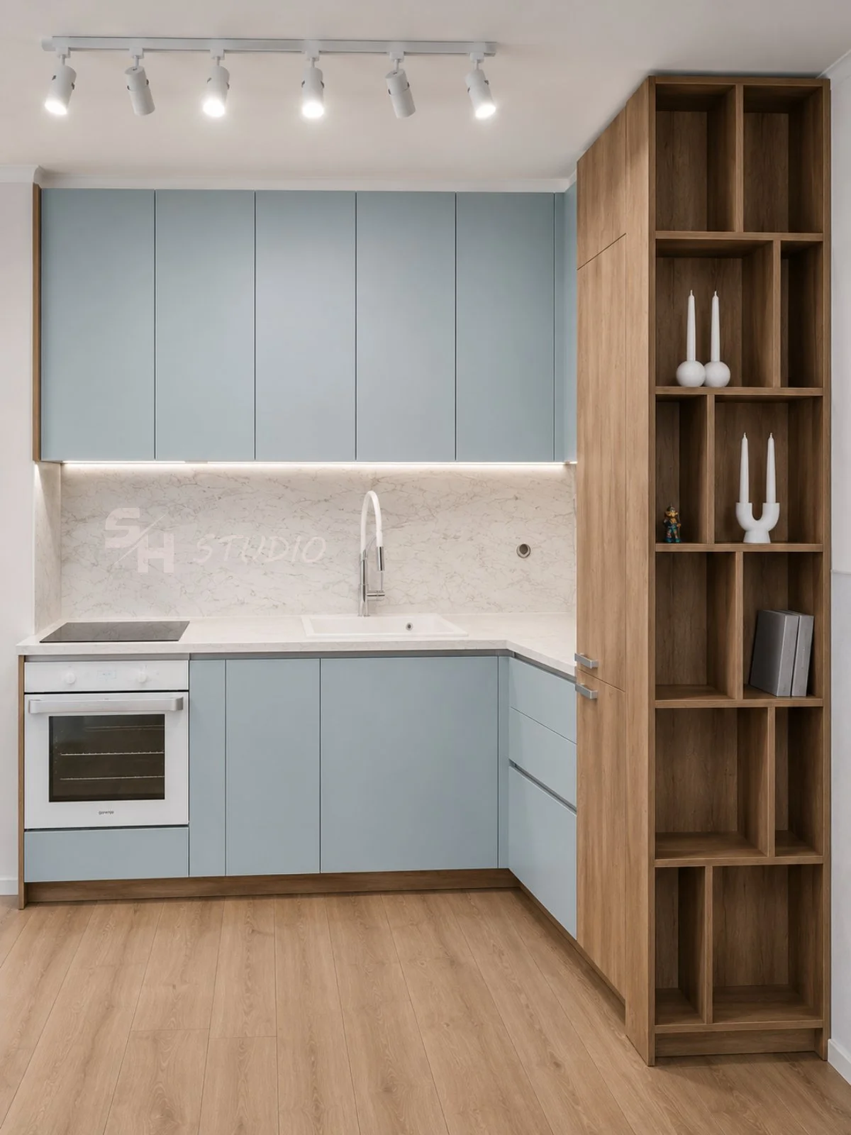 GB Residence — pale blue kitchen with oak-effect open shelving column